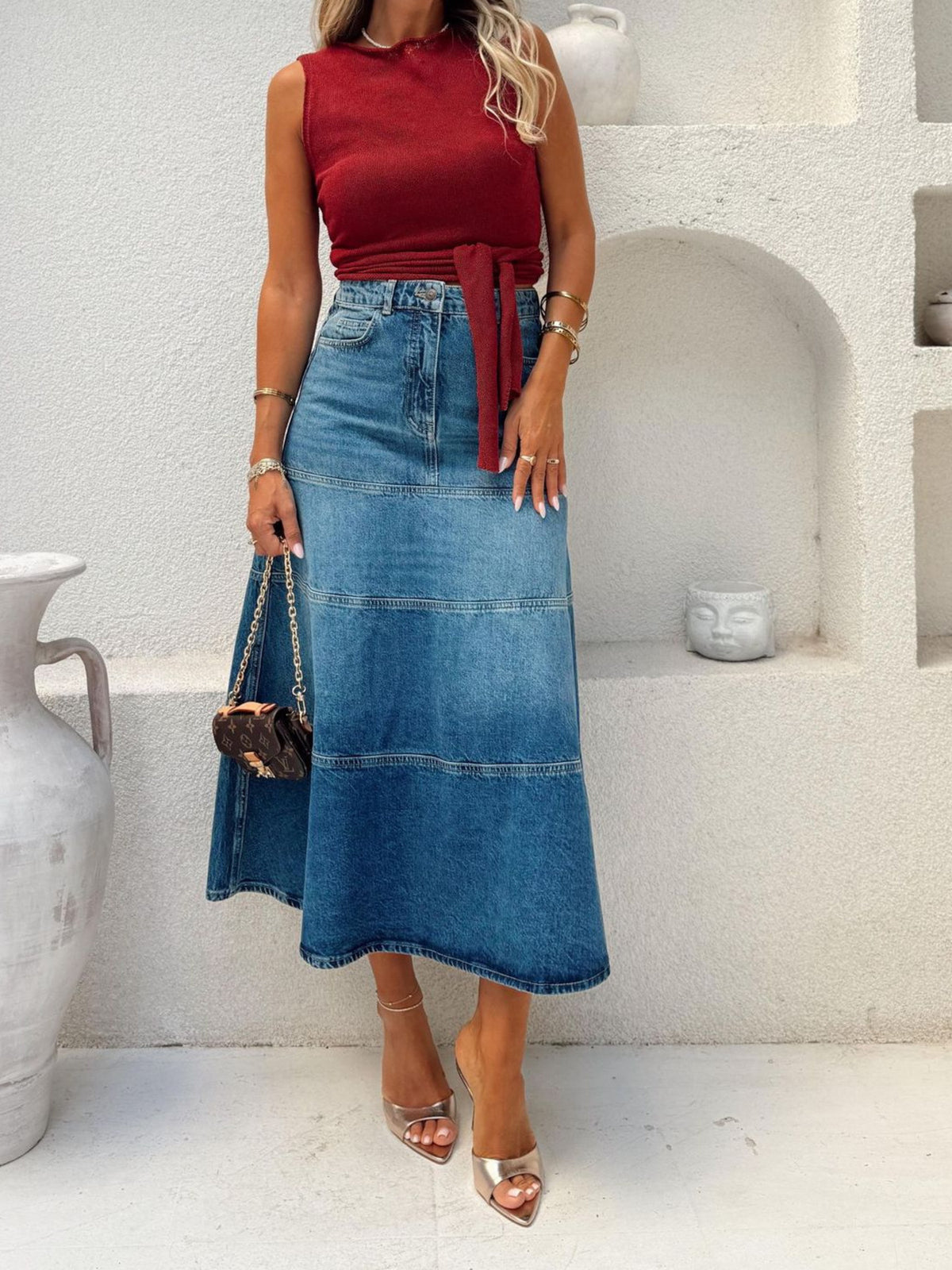 Dusty blue belted high-waist midi skirt with a flowing silhouette