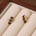 Berry triple-heart stud earrings, product view