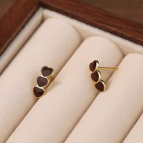 Berry triple-heart stud earrings, product view