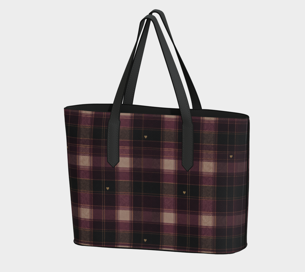 Angled view of Falling for You plaid heart vegan leather tote in berry, plum, and charcoal green with black straps.