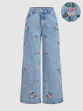 Blue wide-leg jeans with delicate scattered wildflower embroidery