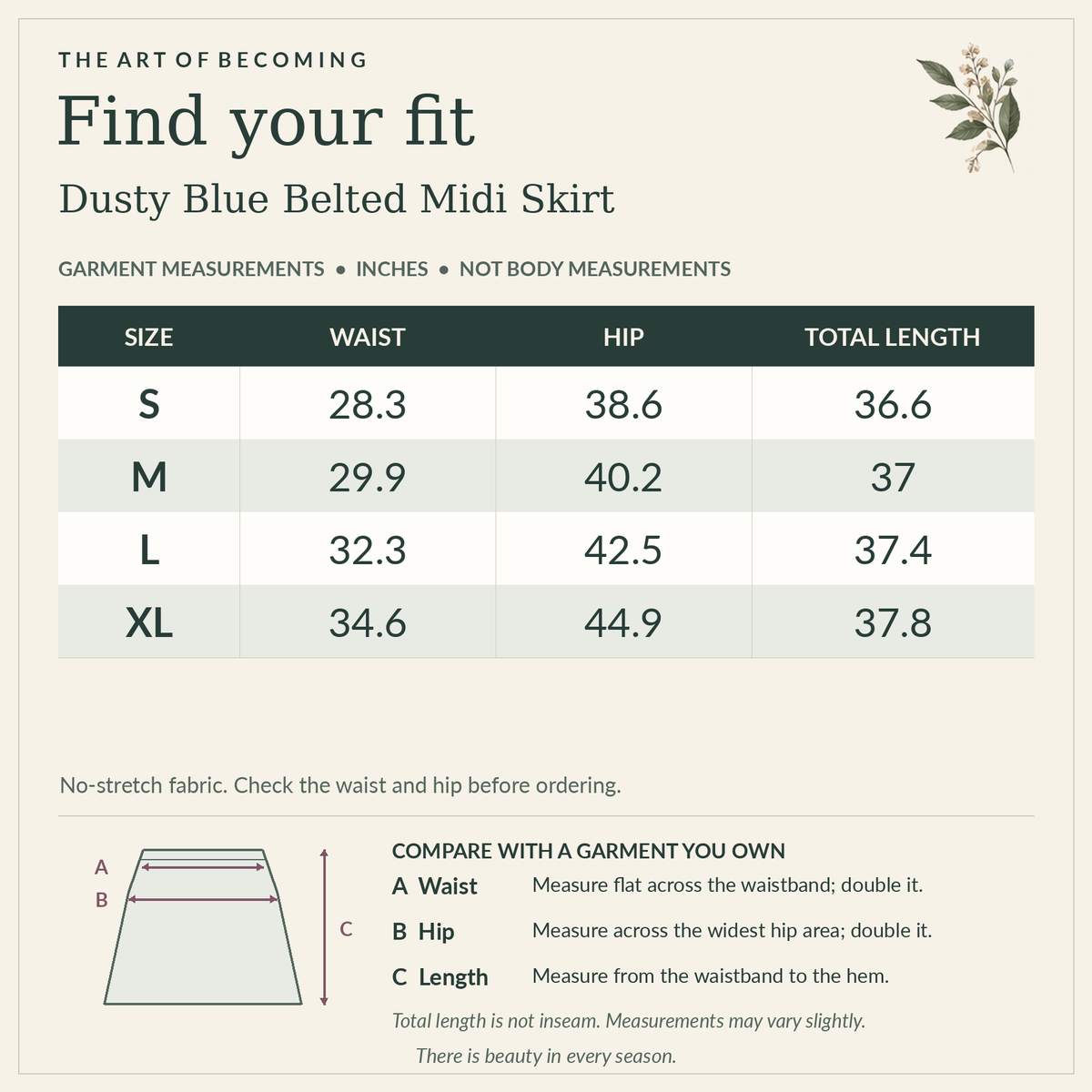 Dusty Blue Belted Midi Skirt size chart, S–XL. Waist, hip and total skirt length in inches. Garment measurements, not body measurements. Includes a flat-garment measuring diagram. Full measurements also appear in the description.