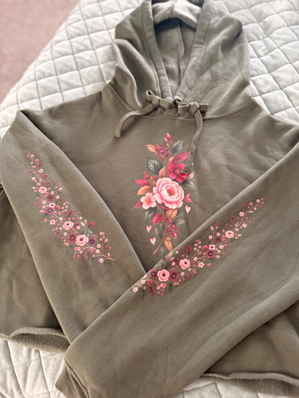Falling For You olive cropped hoodie with floral front and sleeve details shown in real life