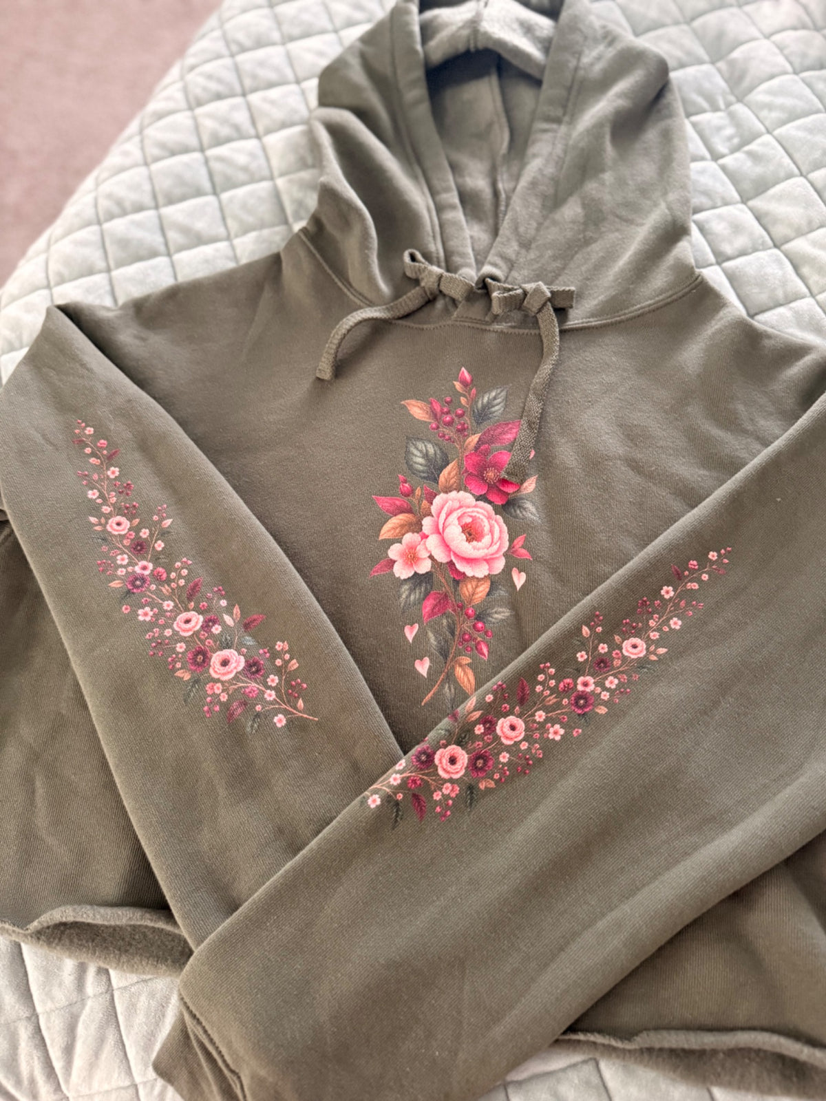 Falling For You olive cropped hoodie with floral front and sleeve details shown in real life