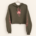 Front view of Falling For You olive cropped hoodie with pink and berry floral print on the chest and sleeves