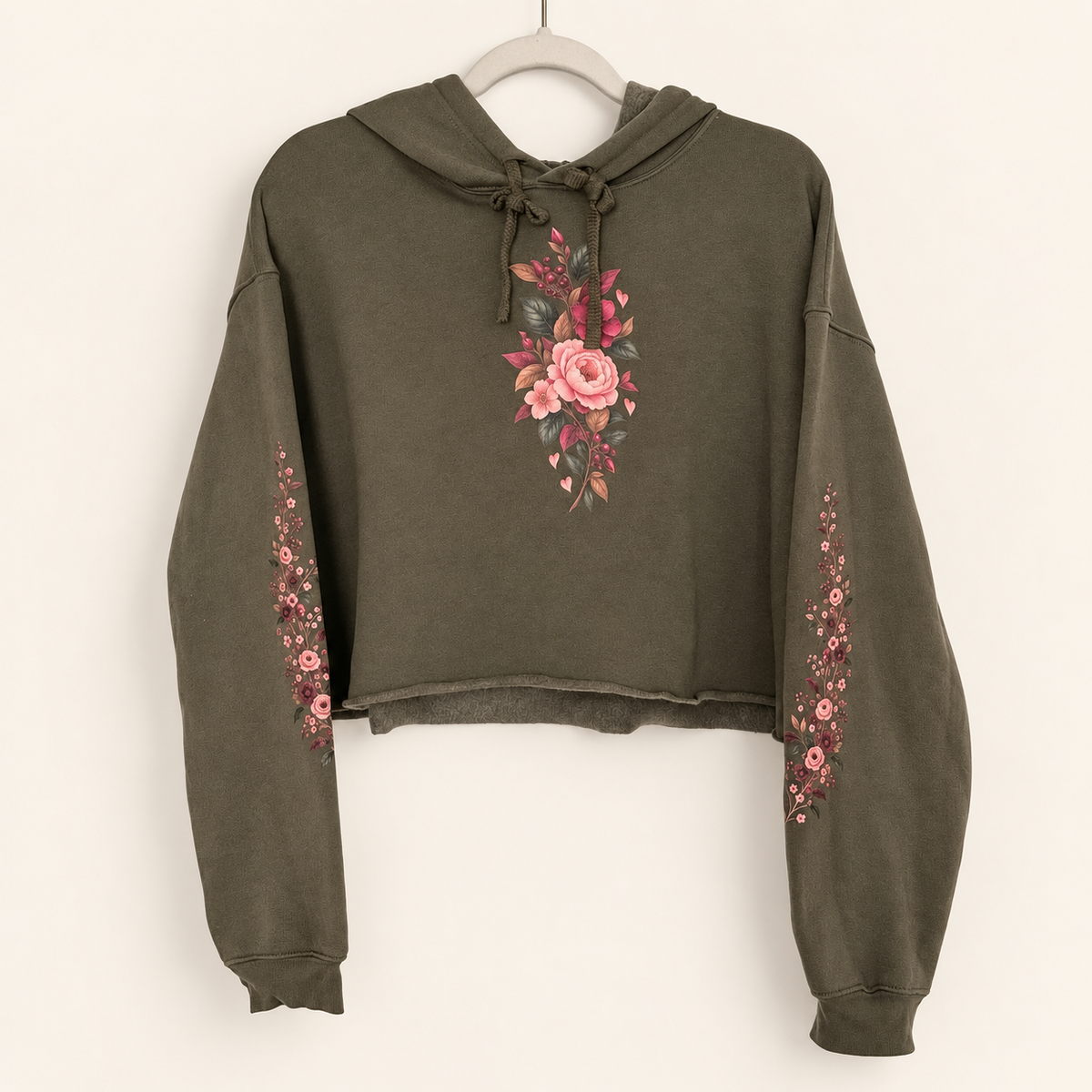 Front view of Falling For You olive cropped hoodie with pink and berry floral print on the chest and sleeves