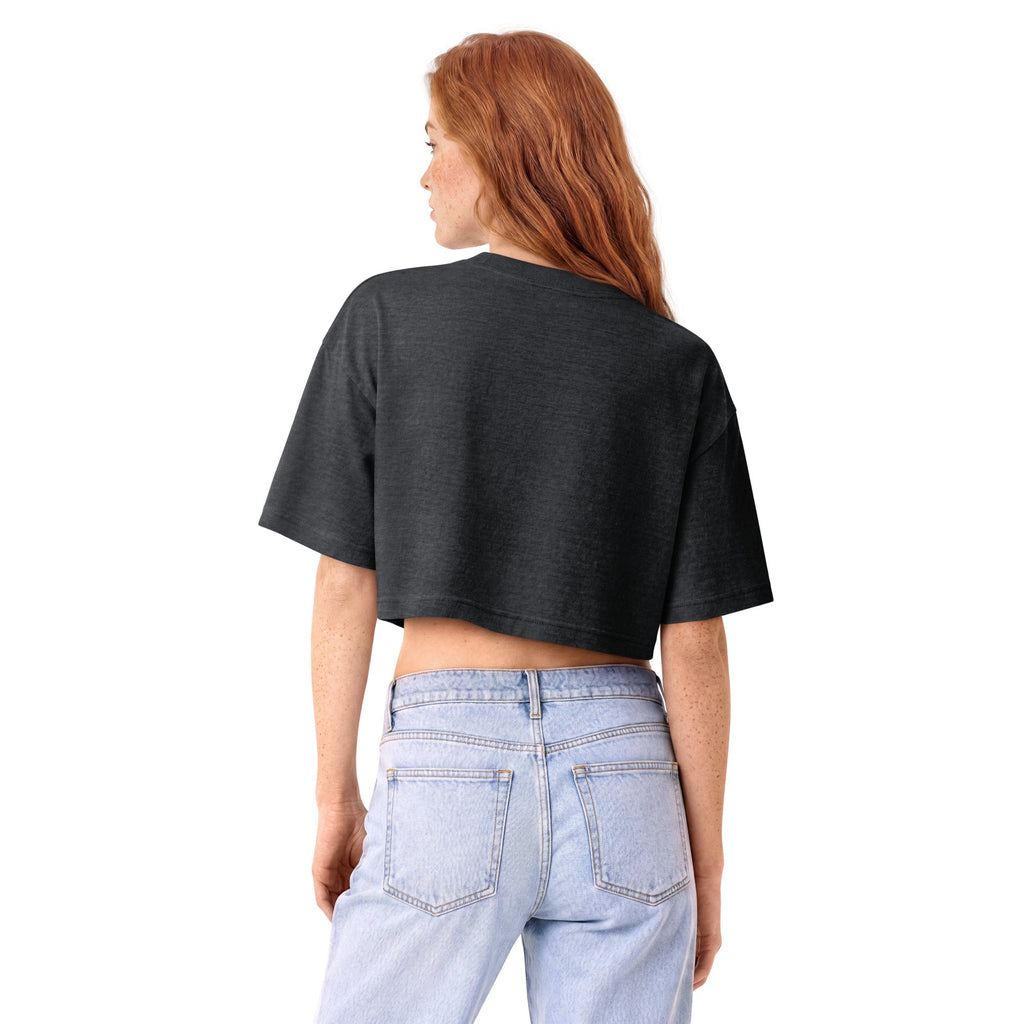 Back view of washed black women’s garment-dyed cropped tee